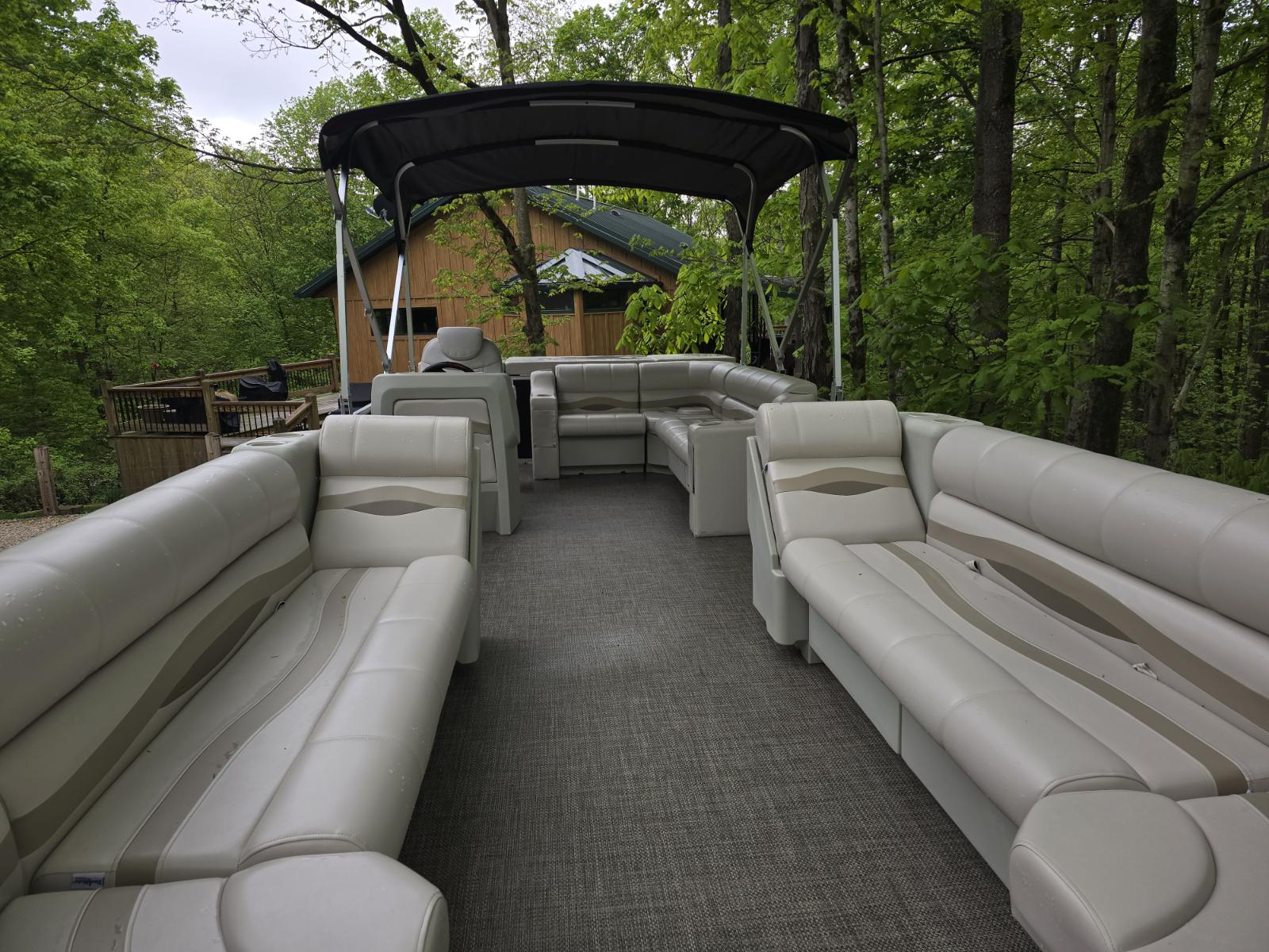 Custom gray marine upholstery and flooring on a pontoon boat by Erbco in Vincent, Ohio