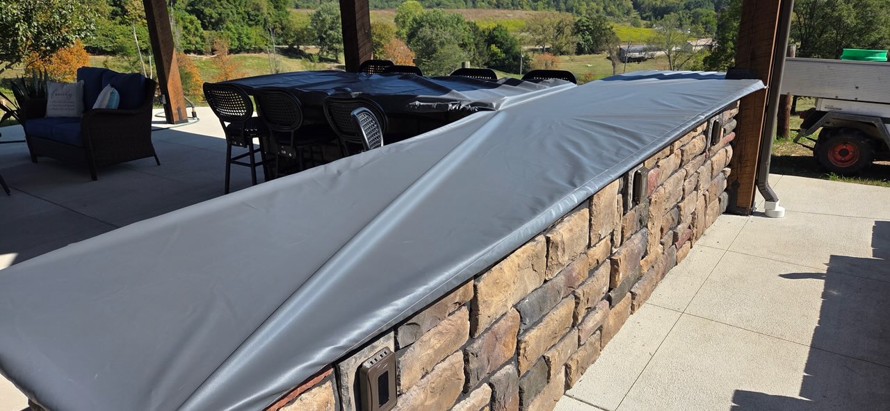 Custom gray outdoor kitchen cover made by Erbco